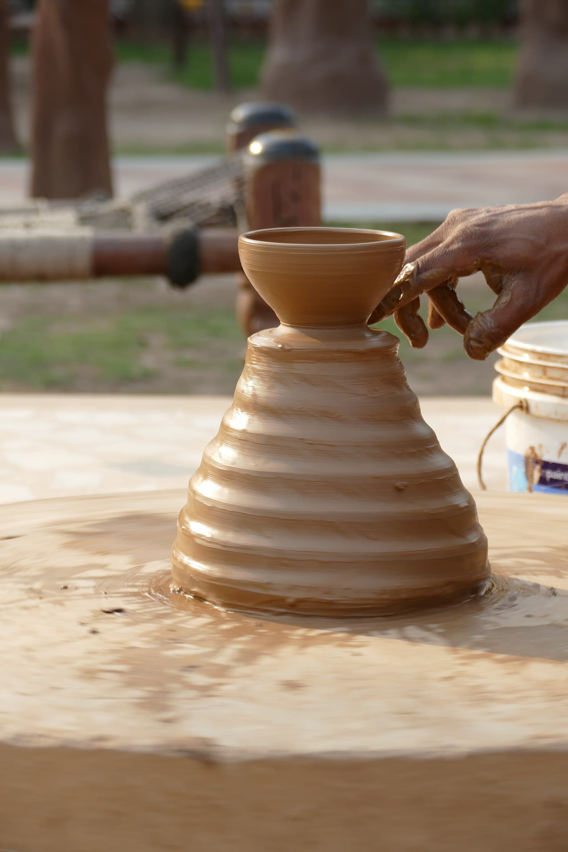 Hand-modelled terracotta drying at the Molela cluster