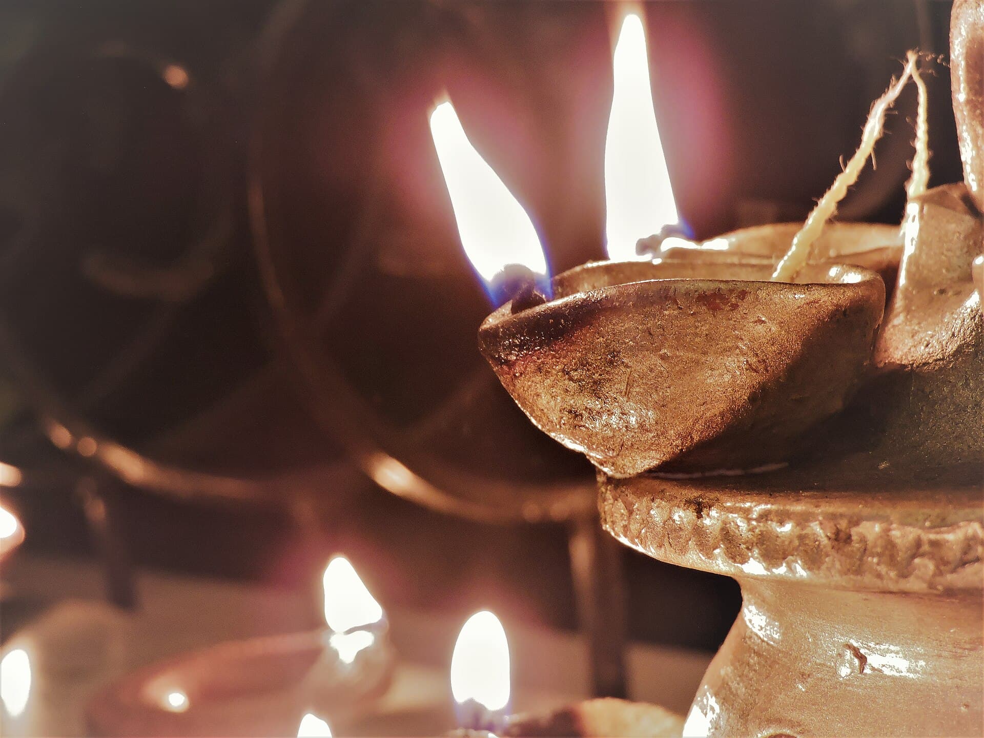 Turned marble taper holders with a candle